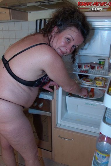 shoving vegetables up her holes