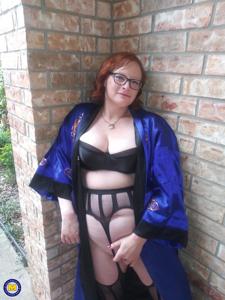 Naughty American mature lady playing with her wet pussy