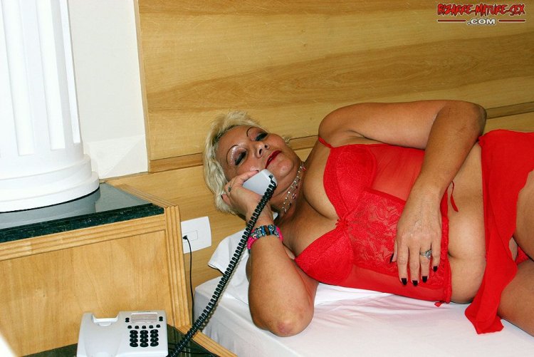 tattoo guy is giving this mature slut a hard fucking