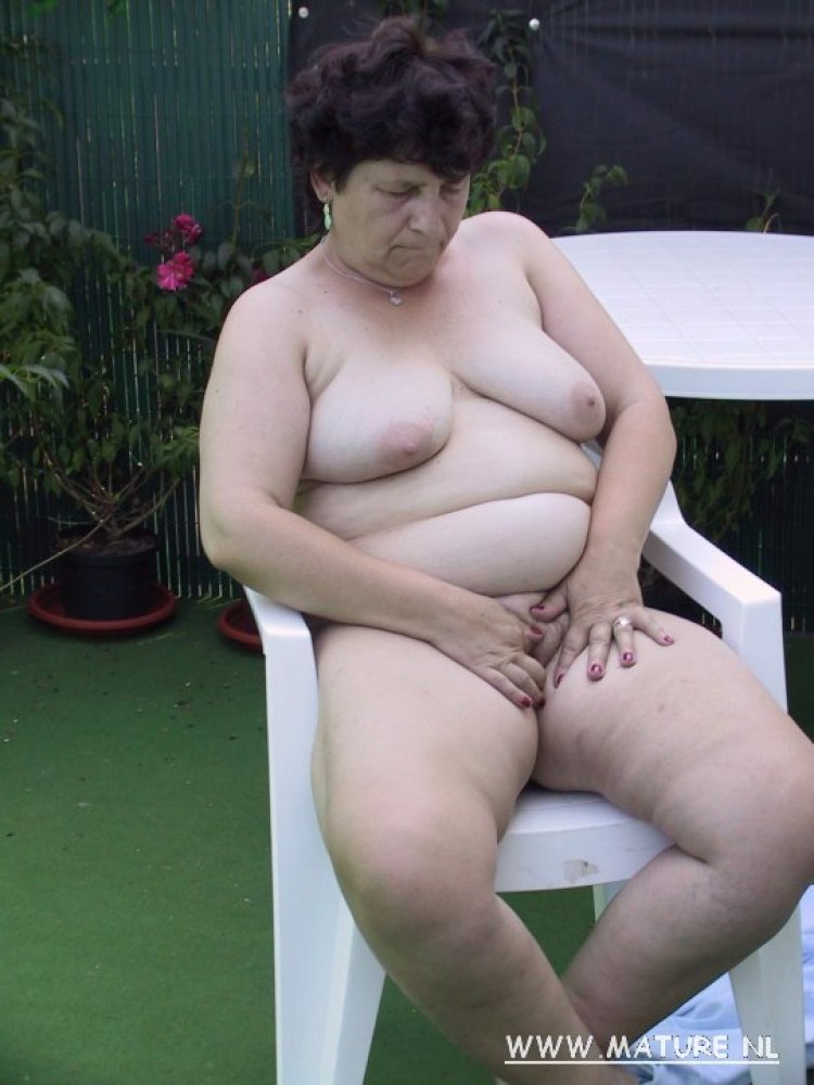 Mama playing with her toys in the garden