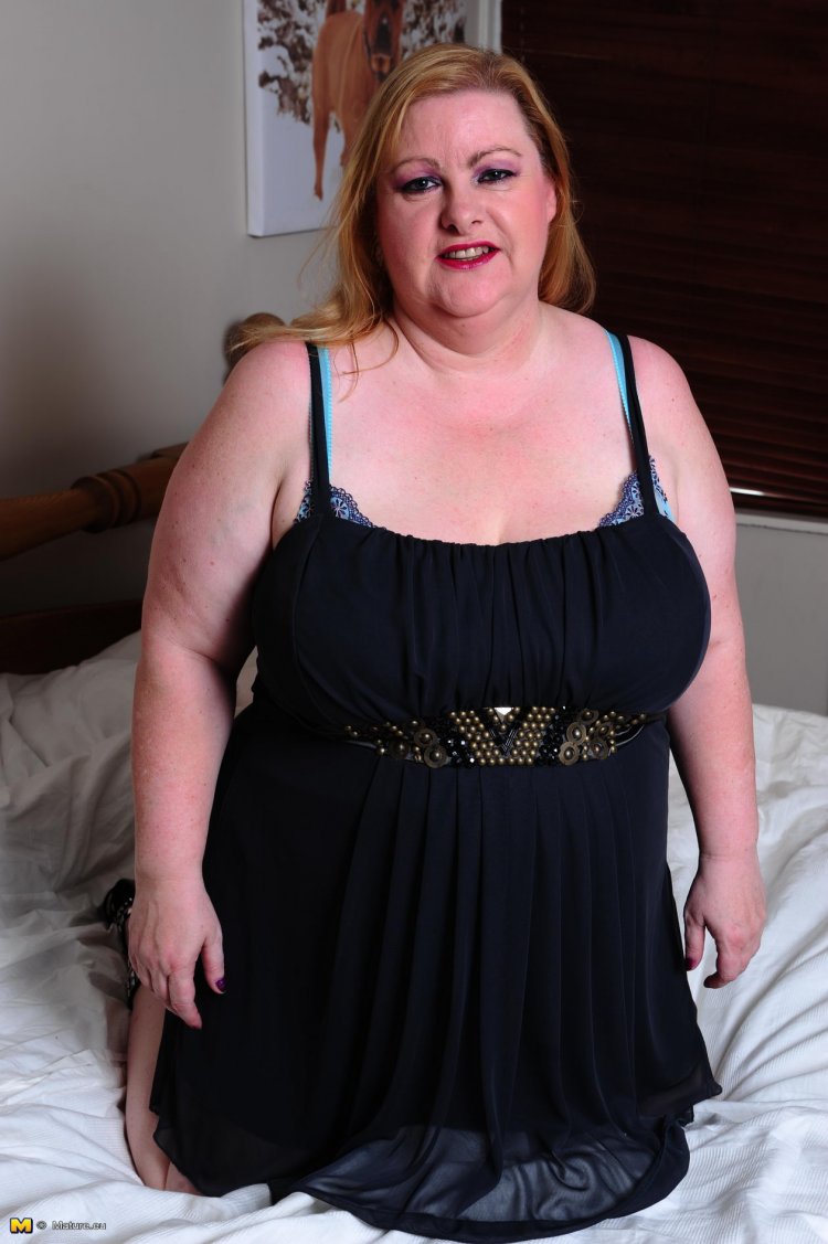 This big mama with her huge tits is horny as hell