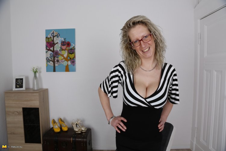 Naughty German housewife showing off her dirty mind