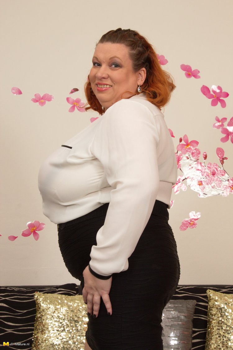 Huge breasted mature BBW playing with her toy boy