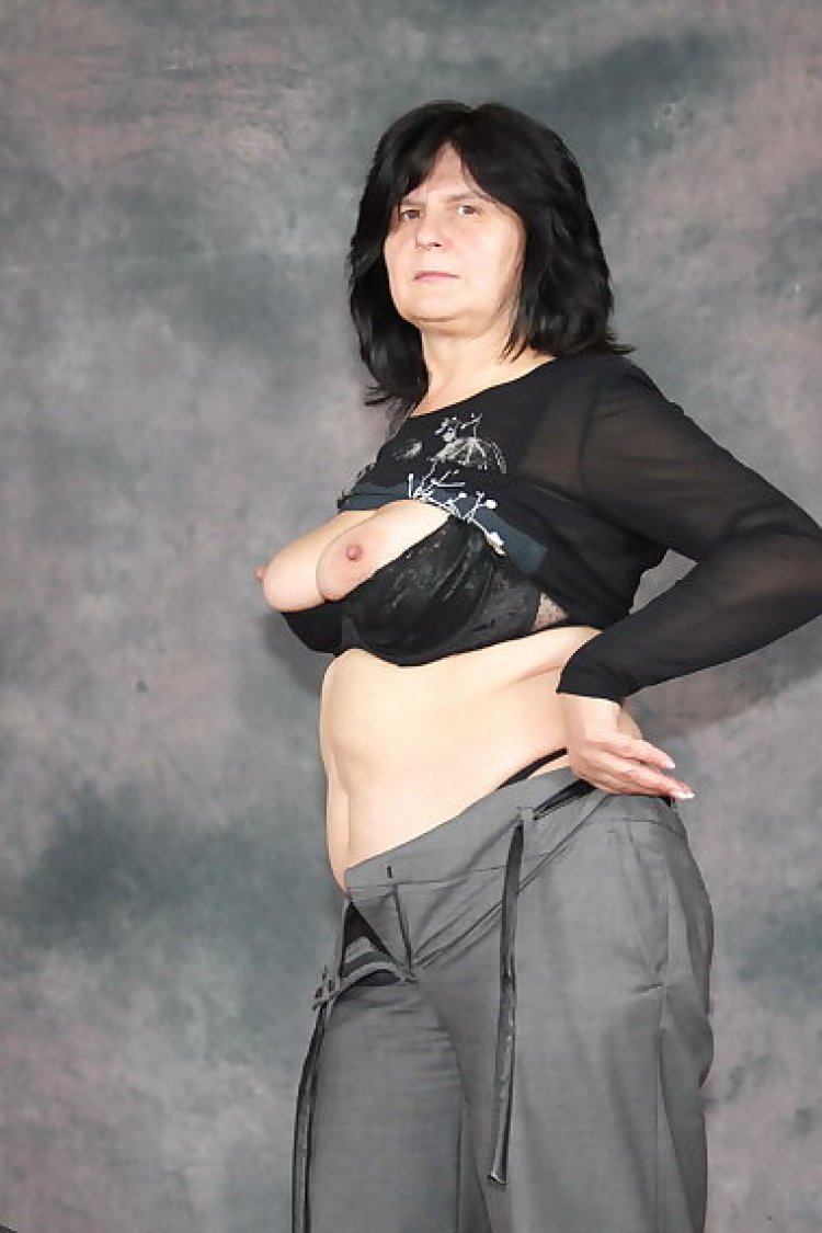 Check out this horny mature slut play all alone