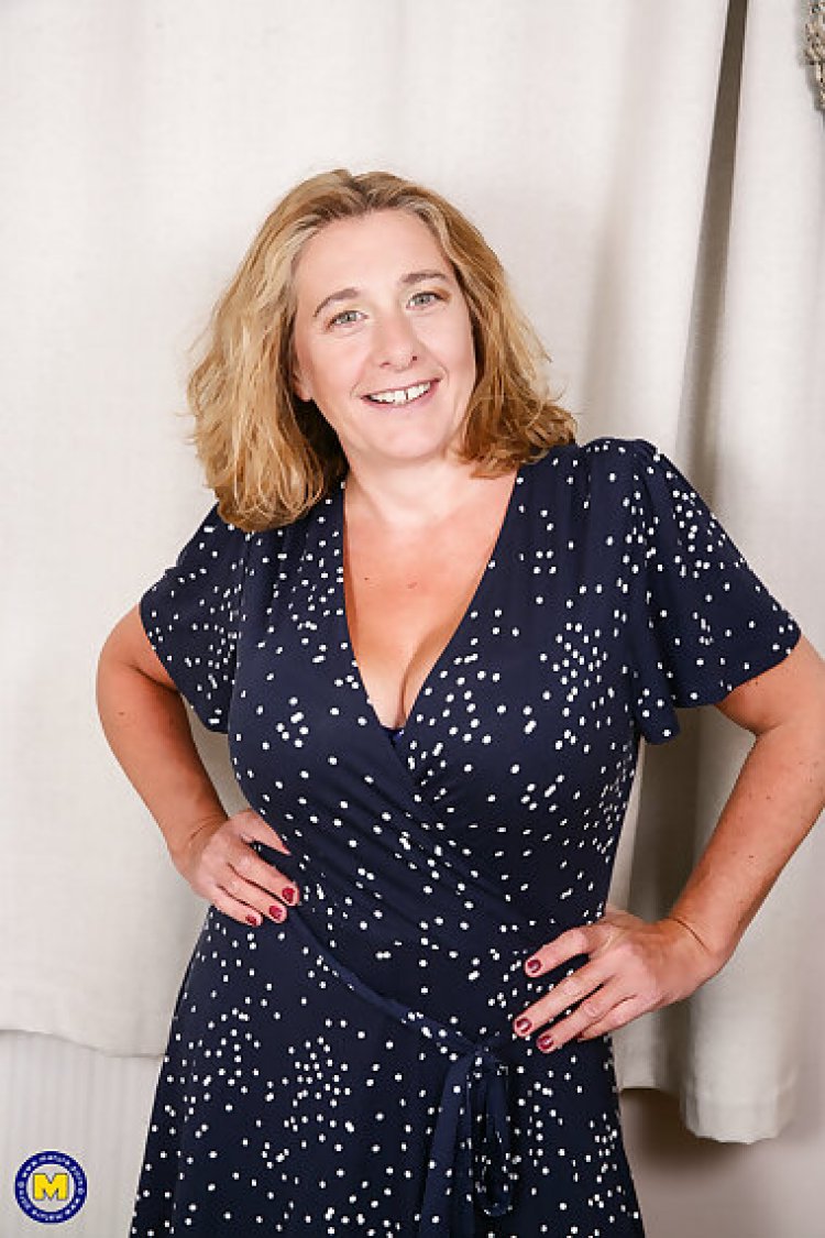 Naughty camilla playing with her big natural tits