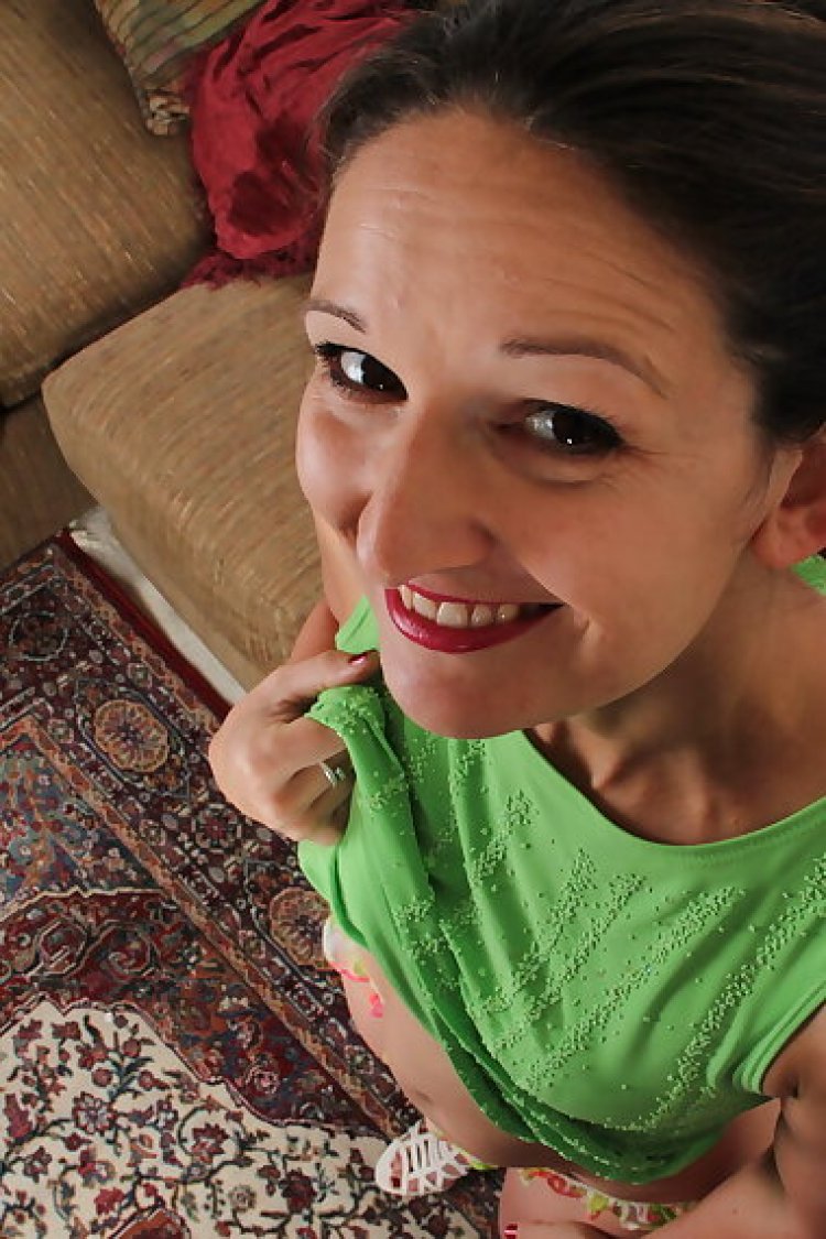 Cute american housewife stripping at home