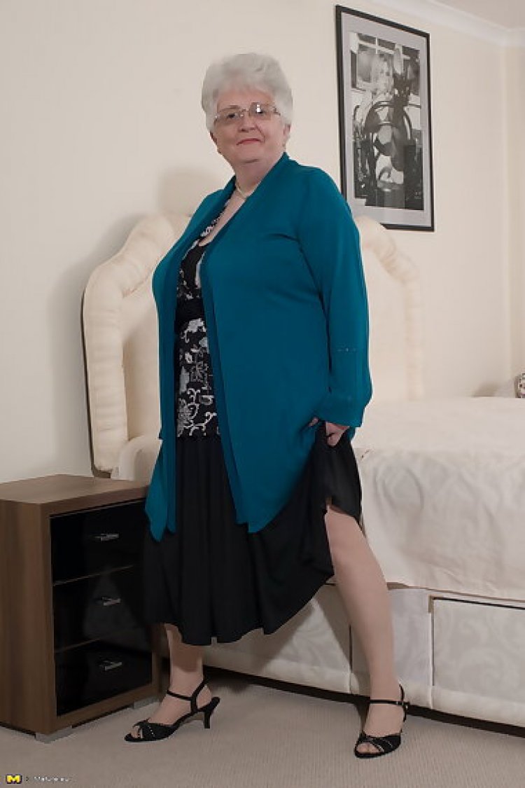 Naughty big breasted british granny getting frisky