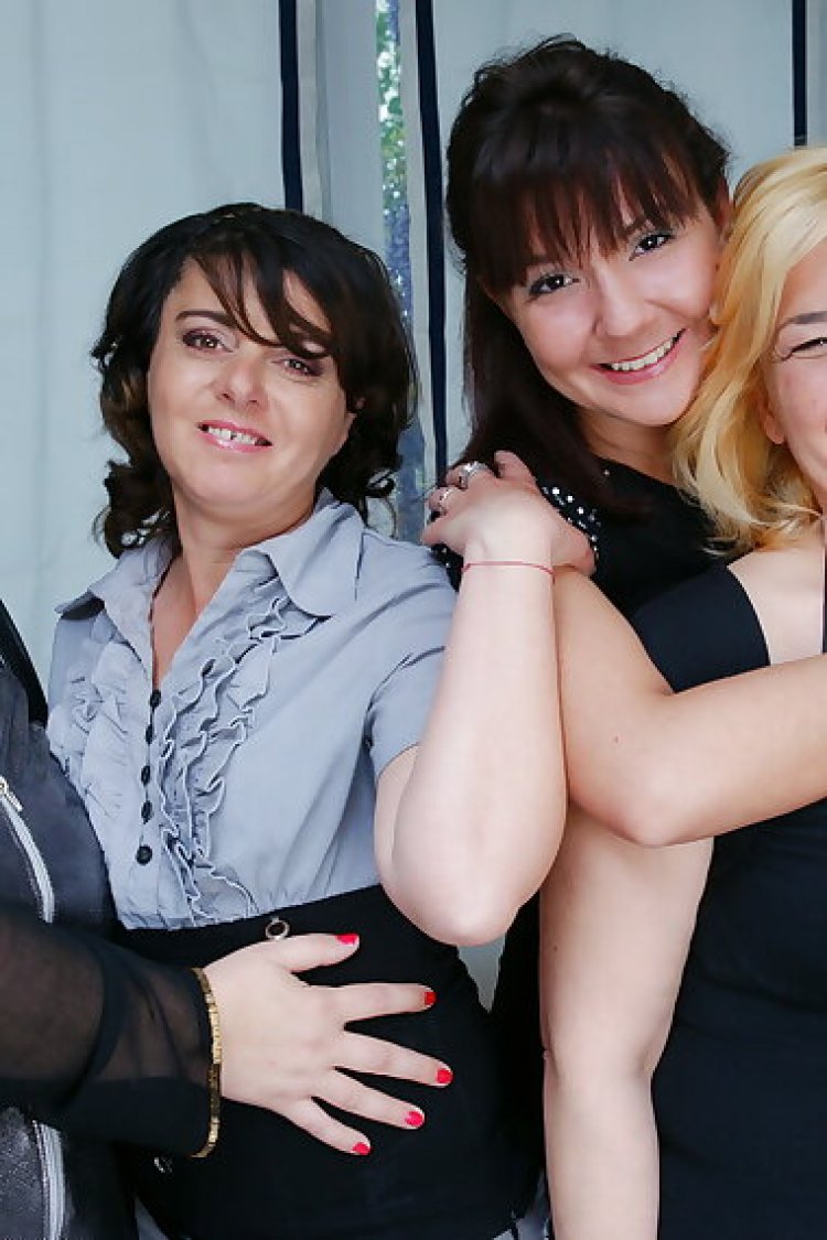 Four old and young lesbians having a party