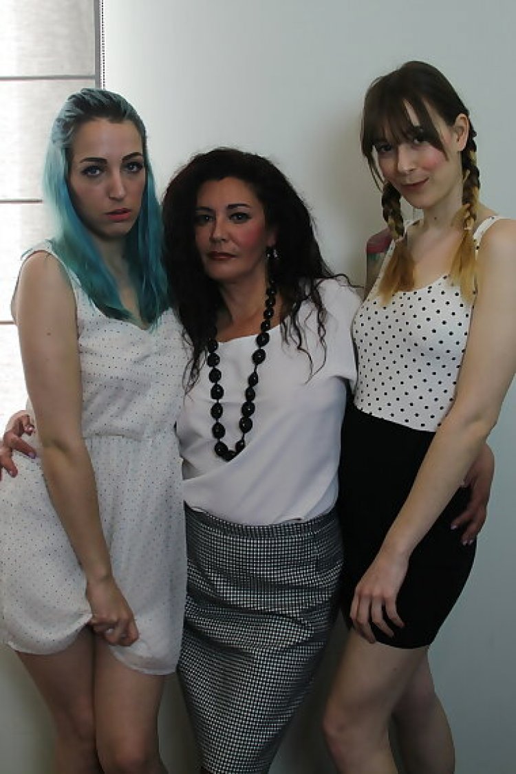 Three spanish old and young lesbians playing together