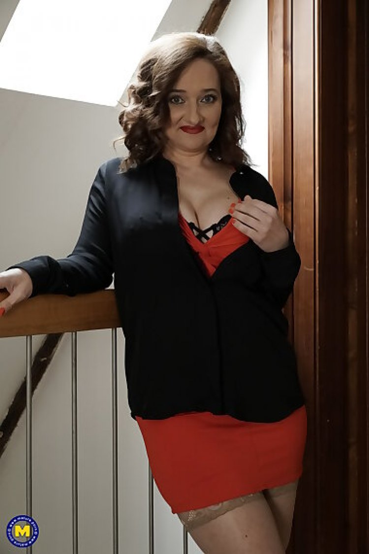 Big breasted milf playing with her pussy in the hallway