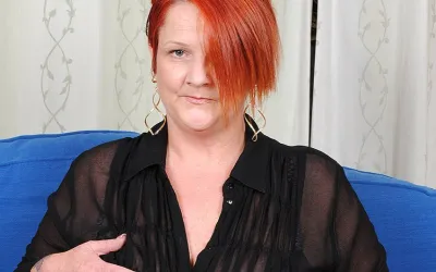 Chubby Red Mature Slut Playing with Her Pussy - Mature.nl