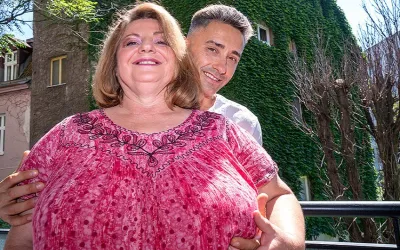 Huge breasted mature BBW fucking a muscled younger man