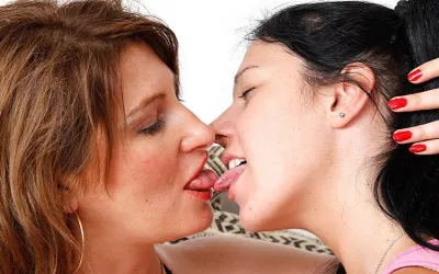 These Hot Old and Young Lesbians Make out on the Couch - Mature.nl