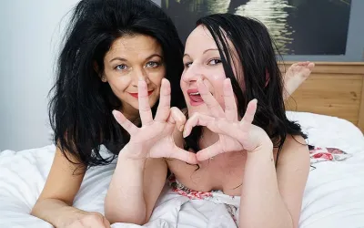 Two Horny Old and Young Lesbians Make out on the Bed - Mature.nl